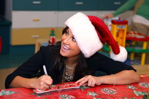 Adrienne Bailon visits children at the Beth Israel Medical Center in New York 