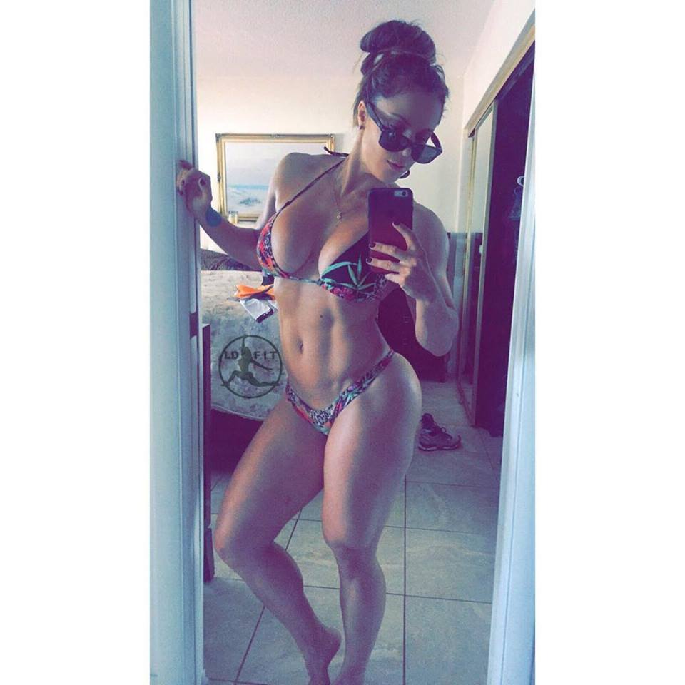 Linda Durbesson in a bikini taking a selfie