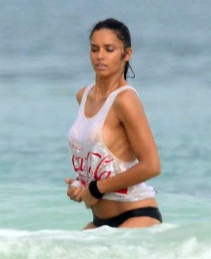 Adriana Lima – beach shoot candids in Cancun 12/2/13 