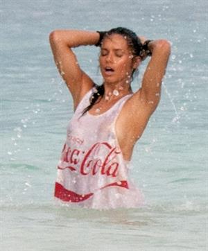 Adriana Lima – beach shoot candids in Cancun 12/2/13 