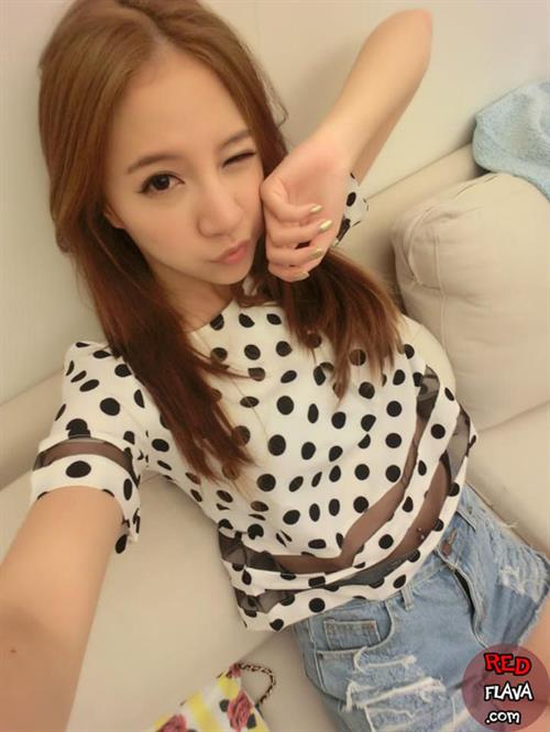 Lin Cai Ti taking a selfie