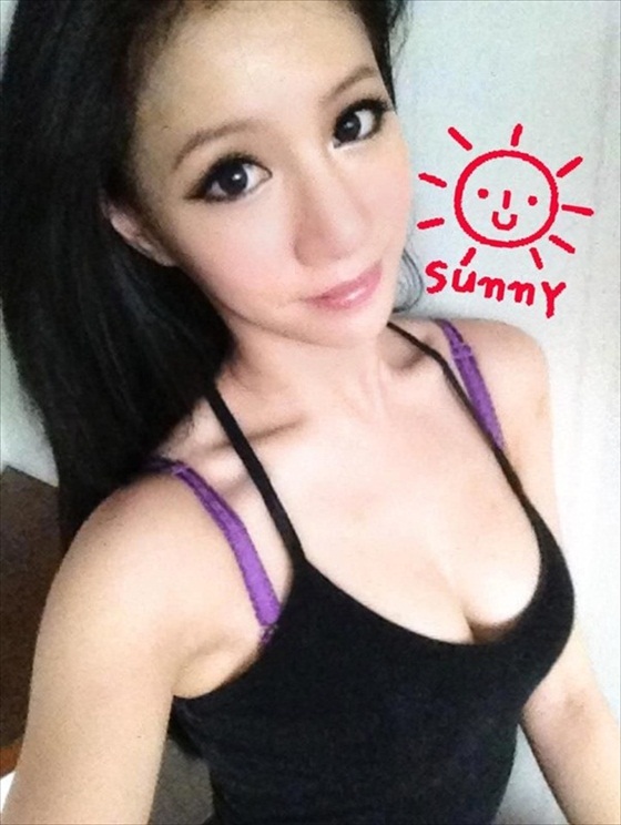 Lin Cai Ti taking a selfie