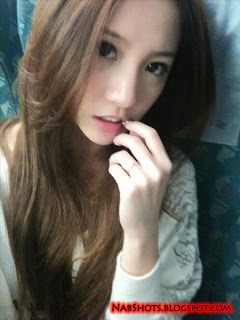 Lin Cai Ti taking a selfie