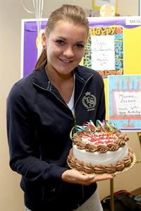 Agnieszka Radwanska is presented a cake for her birthday during the BNP Paribas Open March 6, 2013 