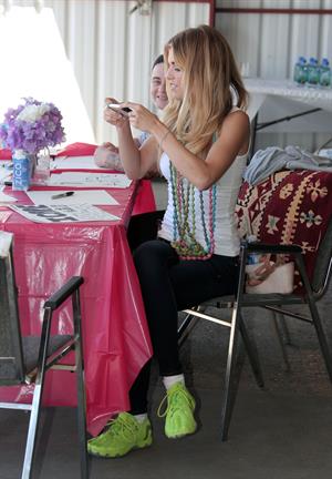 AnnaLynne McCord skydives from 18,000 feet at a charity event, Lompoc August 16, 2014