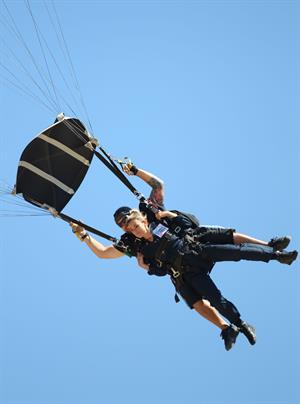 AnnaLynne McCord skydives from 18,000 feet at a charity event, Lompoc August 16, 2014