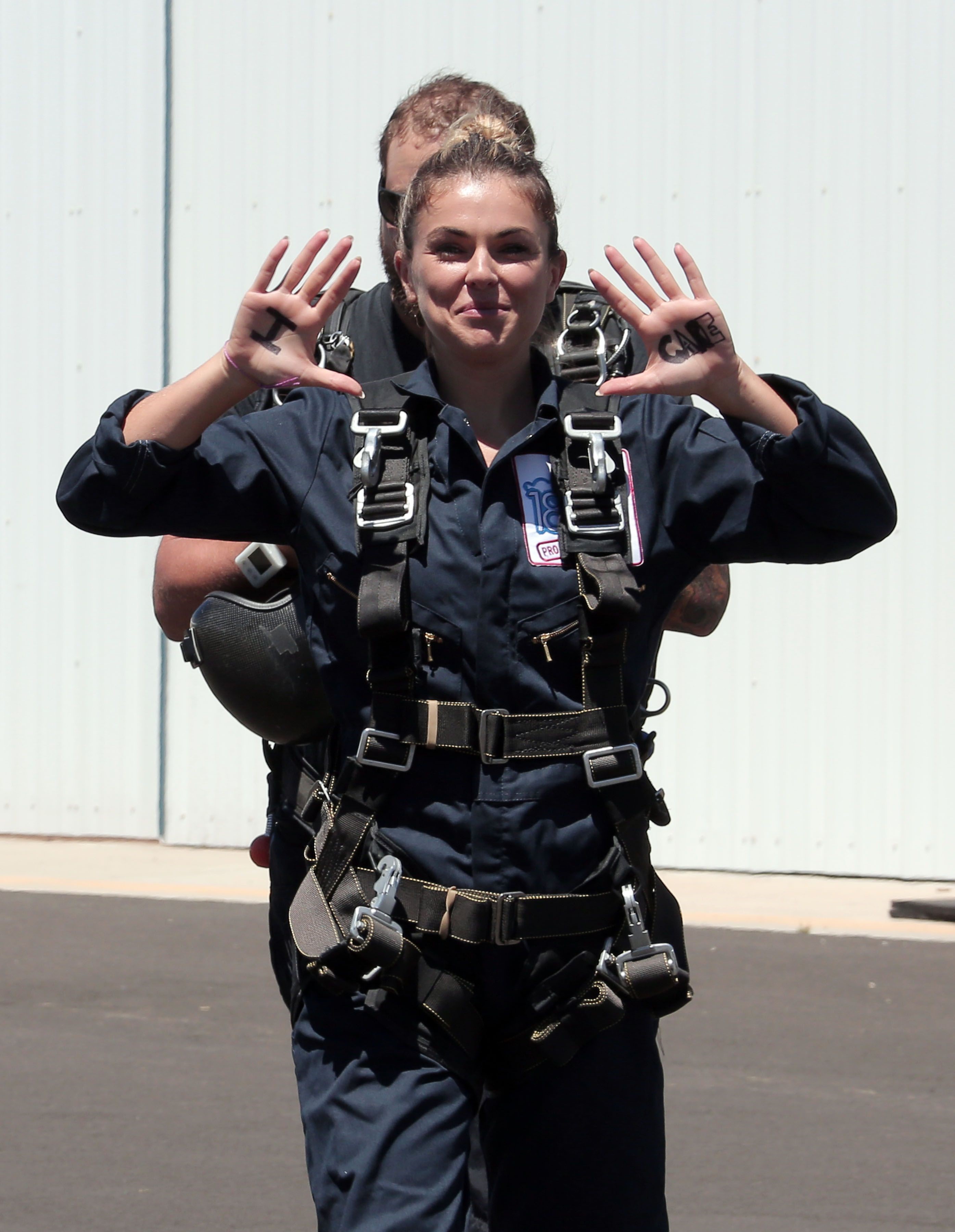 AnnaLynne McCord skydives from 18,000 feet at a charity event, Lompoc August 16, 2014