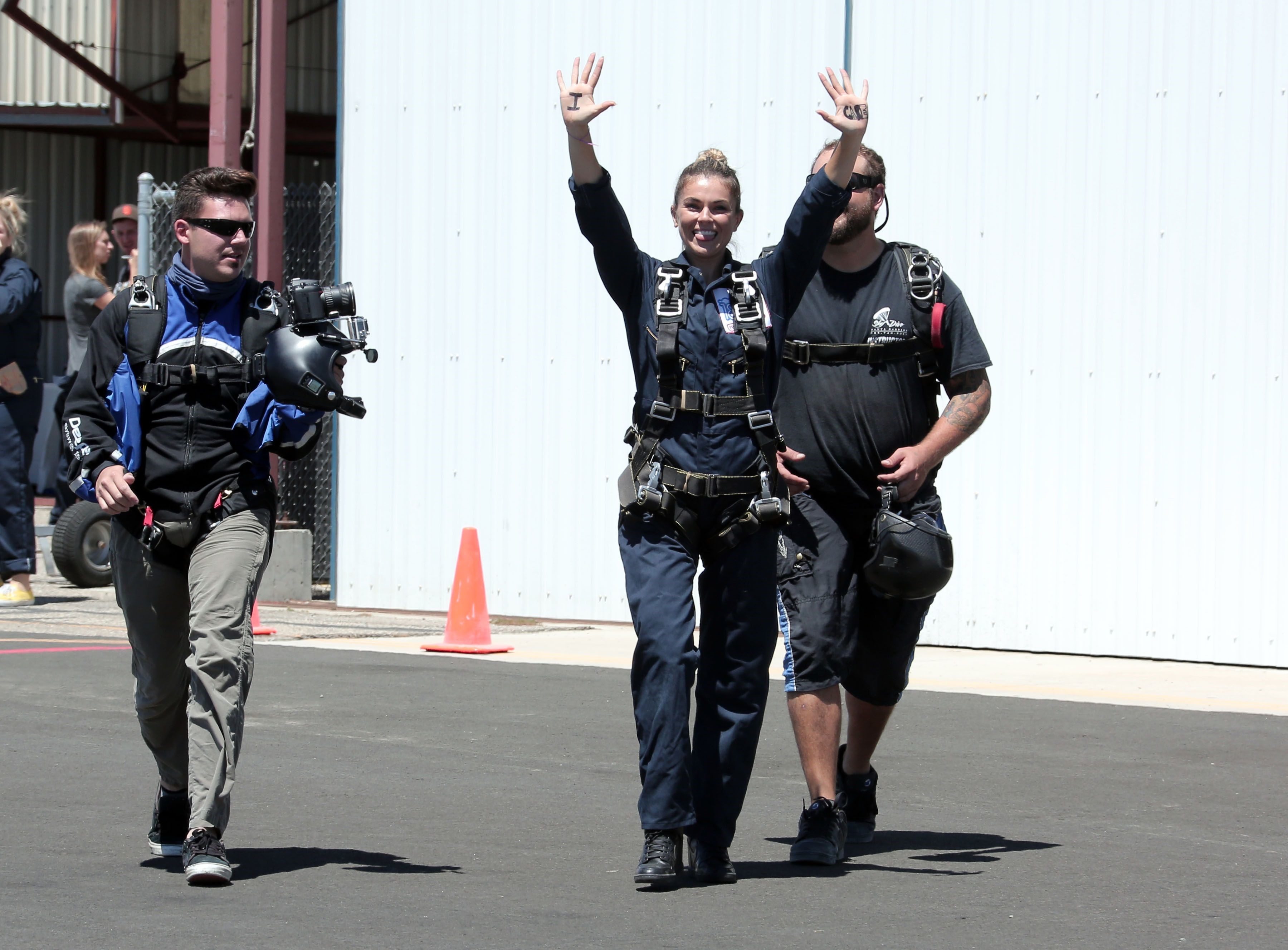 AnnaLynne McCord skydives from 18,000 feet at a charity event, Lompoc August 16, 2014