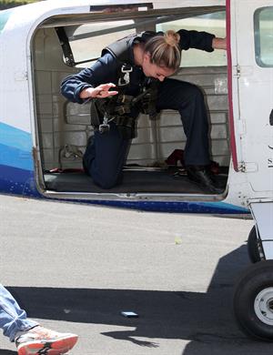 AnnaLynne McCord skydives from 18,000 feet at a charity event, Lompoc August 16, 2014