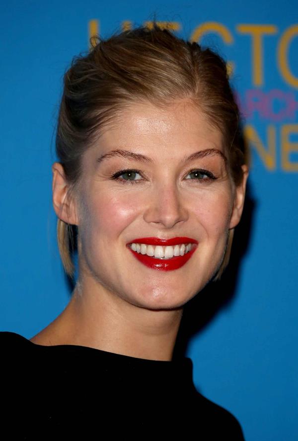 Rosamund Pike Hector and the Search for Happiness London premiere August 13, 2013 at the Empire Leicester Square