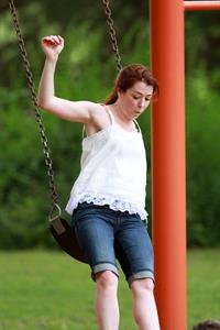 Alyson Hannigan playing in a park in Atlanta July 28, 2011 