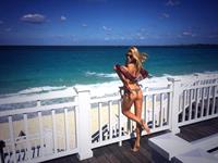 Charlotte McKinney in a bikini - ass