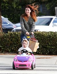 Alyson Hannigan Hangs out with her daughter in Los Angeles (November 22, 2013) 