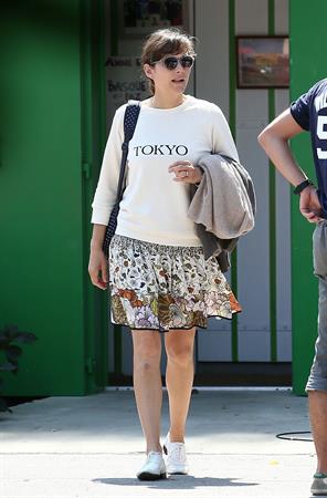 Marion Cotillard strolling down the streets of Cap-Ferret August 12, 2014