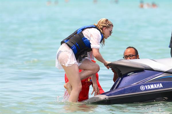 Chloe Grace Moretz candids in a Black Bikini in Miami Beach