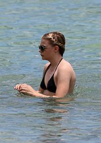 Chloe Grace Moretz candids in a Black Bikini in Miami Beach