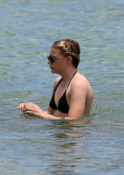 Chloe Grace Moretz candids in a Black Bikini in Miami Beach