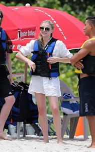 Chloe Grace Moretz candids in a Black Bikini in Miami Beach
