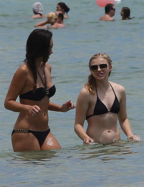 Chloe Grace Moretz candids in a Black Bikini in Miami Beach