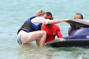 Chloe Grace Moretz candids in a Black Bikini in Miami Beach