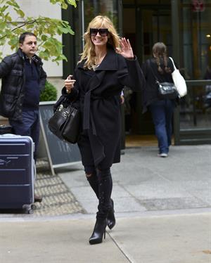 Heidi Klum leaves her hotel in New York City on November 1, 2013