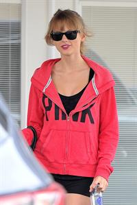 Taylor Swift wearing shorts and a  Pink  jacket in Los Angeles 10/27/13  