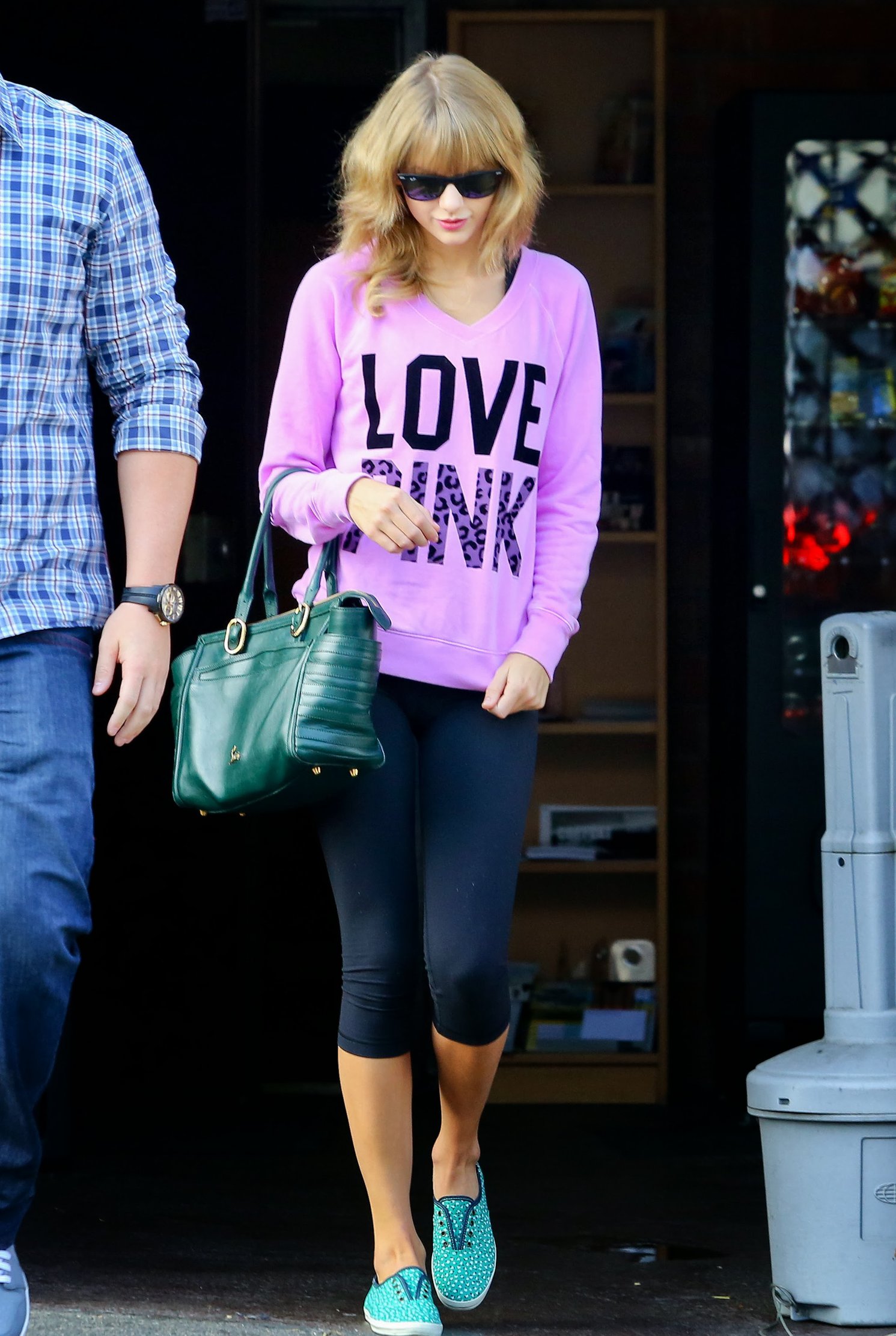 Taylor Swift in a Love Pink shirt in Los Angeles on 10/24/13  