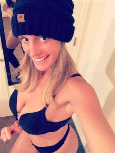 Anonymous in lingerie taking a selfie