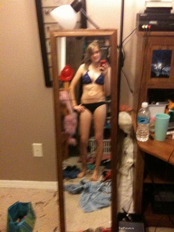 Anonymous in lingerie taking a selfie