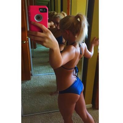 Anonymous in a bikini taking a selfie and - ass