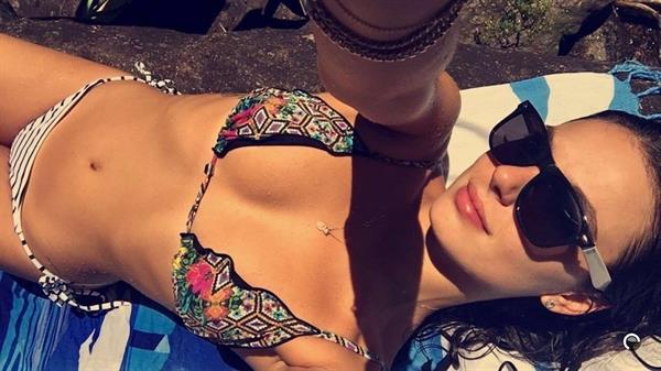 Isis Valverde in a bikini taking a selfie