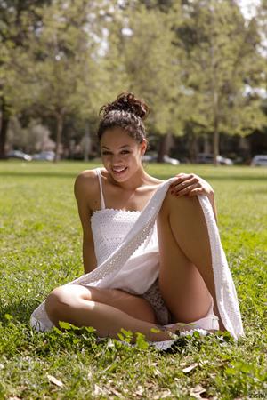 Karissa Kane Nude Pictures Busty Karissa Kane poses nude in the grass