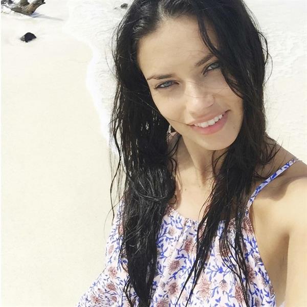 Adriana Lima taking a selfie