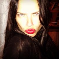 Adriana Lima taking a selfie