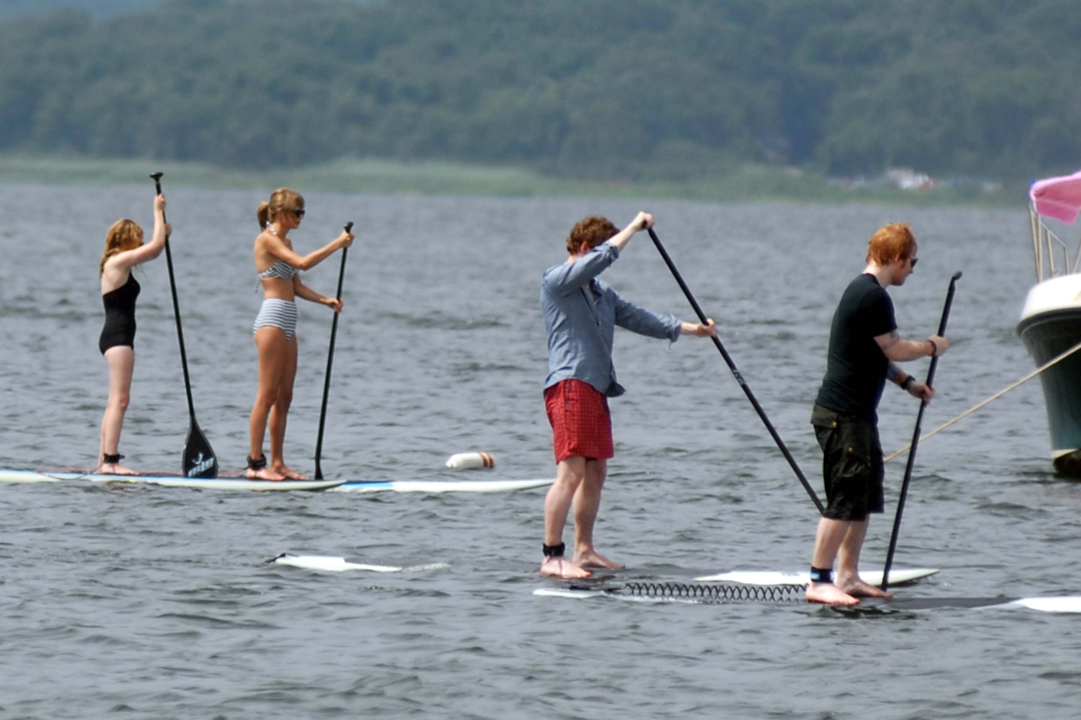 Taylor Swift paddleboarding in Westerly, Massachusetts 7/28/13 