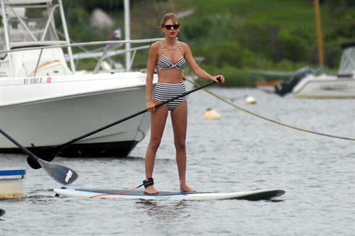 Taylor Swift paddleboarding in Westerly, Massachusetts 7/28/13 