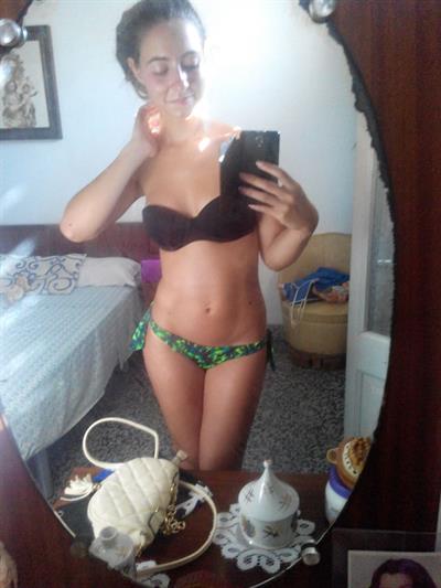 Anonymous in a bikini taking a selfie