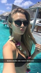 Josephine Skriver in a bikini taking a selfie