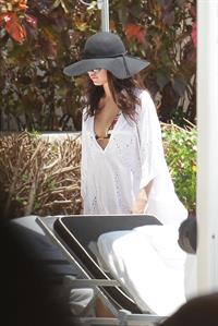 Selena Gomez in bikini by a hotel pool in Miami 5/11/13 