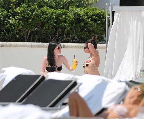 Selena Gomez in bikini by a hotel pool in Miami 5/11/13 