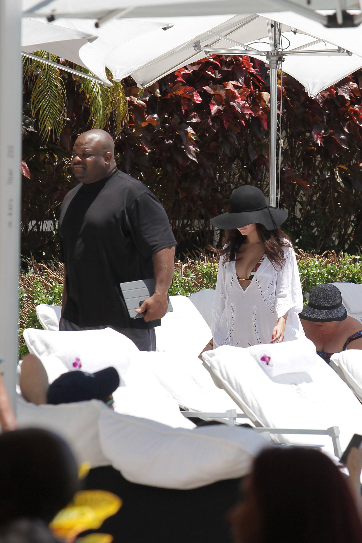 Selena Gomez in bikini by a hotel pool in Miami 5/11/13 