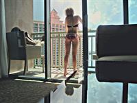 Emily Osment in a bikini