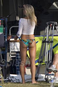 Laura Vandervoort in a bikini - ass