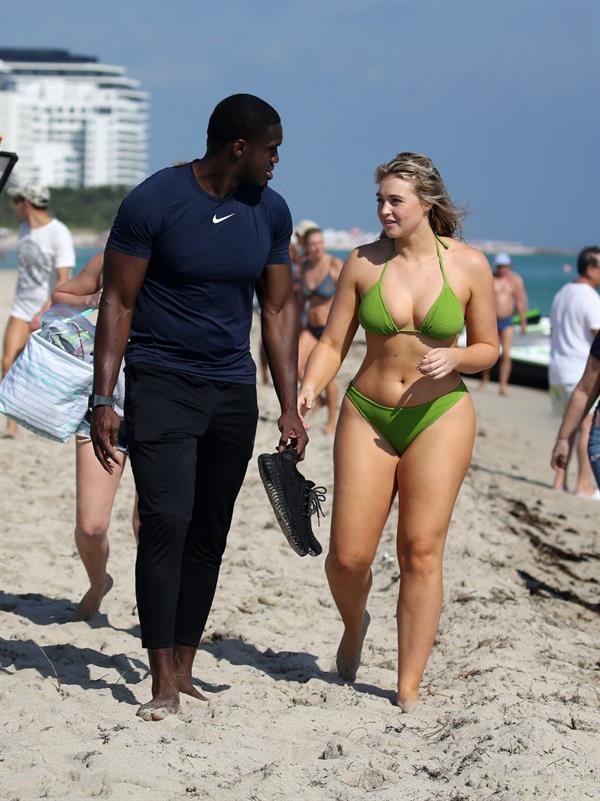 Iskra Lawrence in a swimsuit on Miami beach doing a photoshoot for Aerie on 11/26/2018