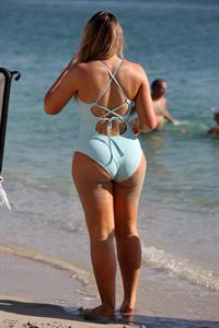 Iskra Lawrence in a swimsuit on Miami beach doing a photoshoot for Aerie on 11/26/2018