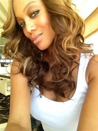 Tyra Banks taking a selfie