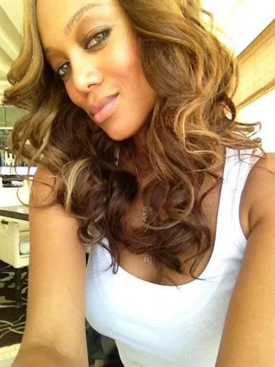 Tyra Banks taking a selfie