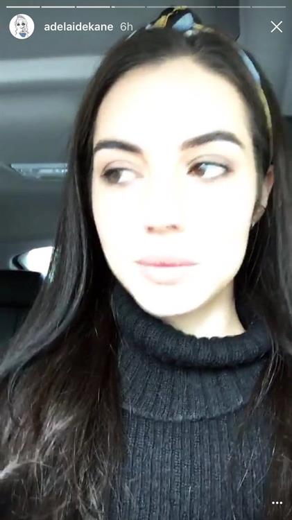 Adelaide Kane taking a selfie