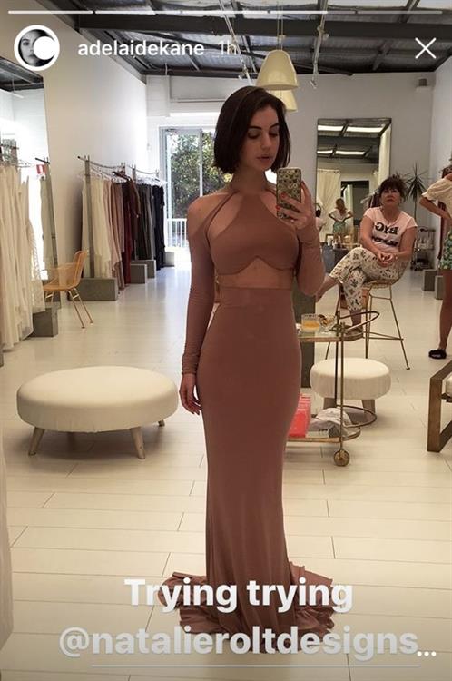 Adelaide Kane taking a selfie