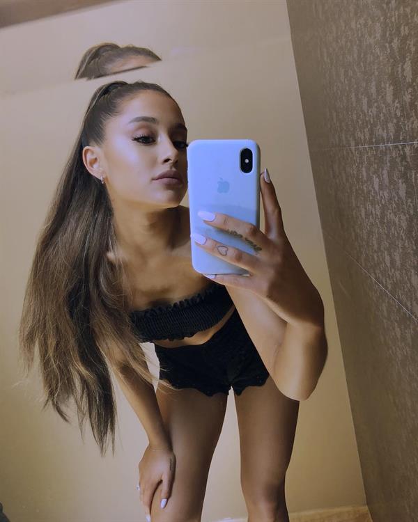 Ariana Grande taking a selfie